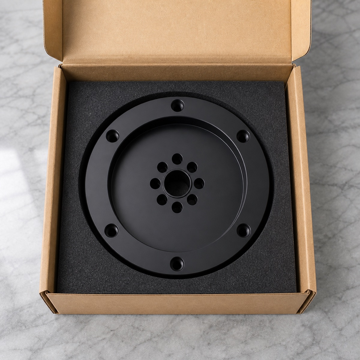 Einzelteil-Schaumverpackung für einen schwarz eloxierten Verbindungsflansch der dritten Roboterachse